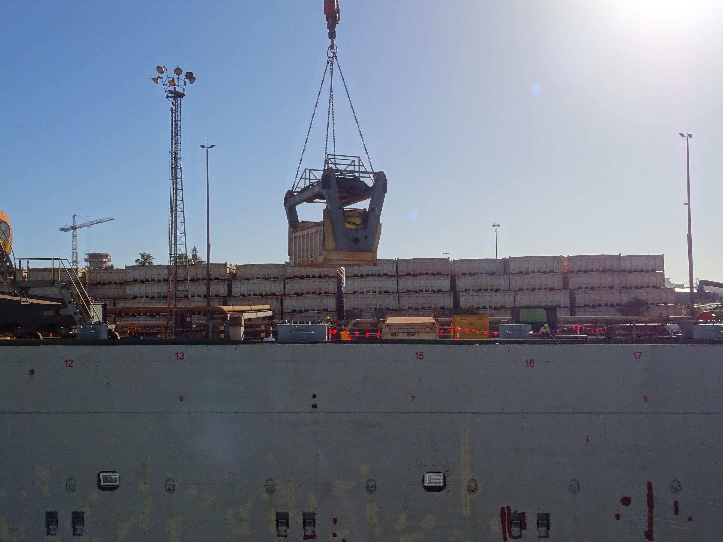 Crane lifting containerised equipment at a Port Hedland berth