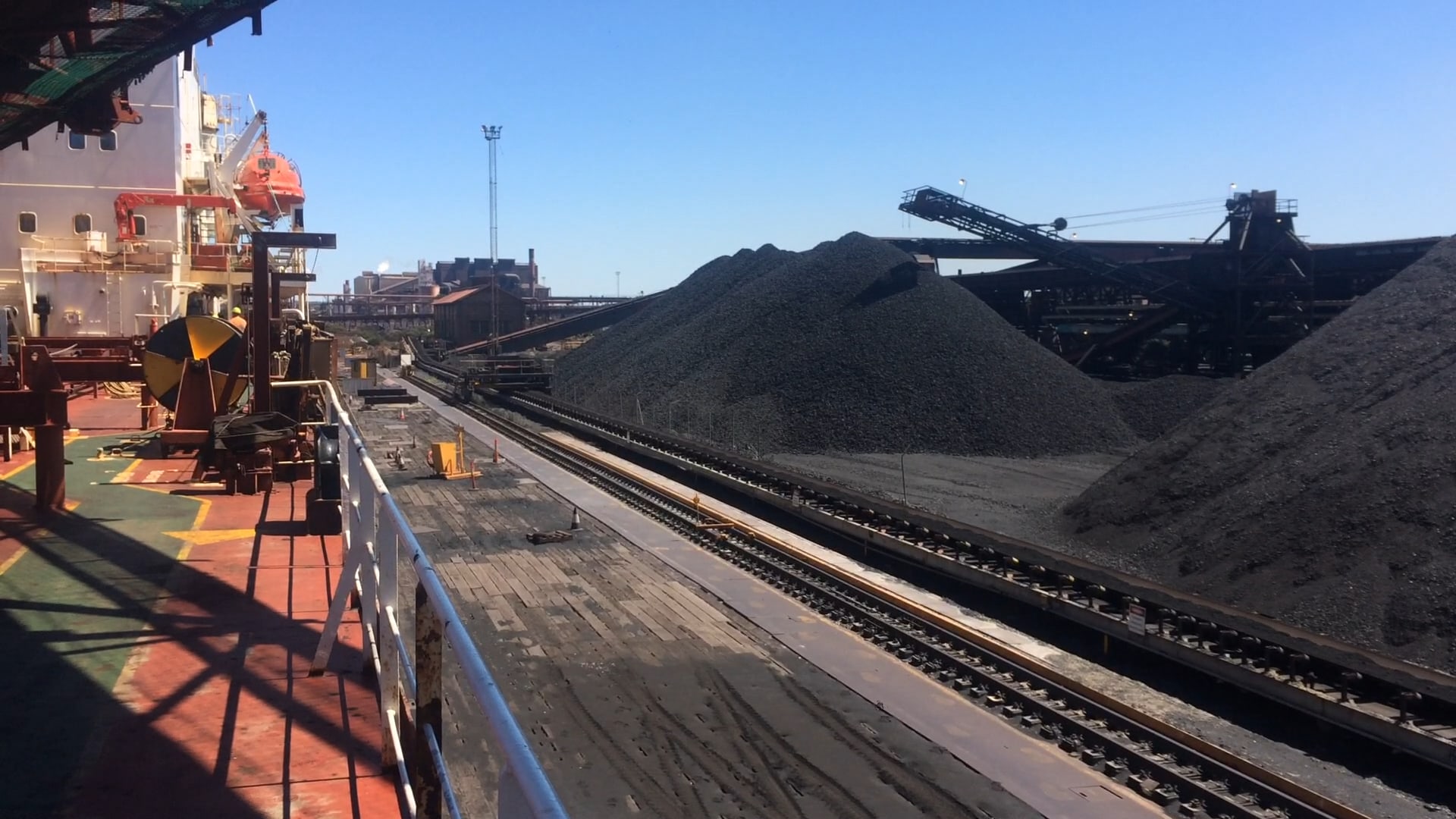 Stockpiles and conveyor infrastructure at Whyalla