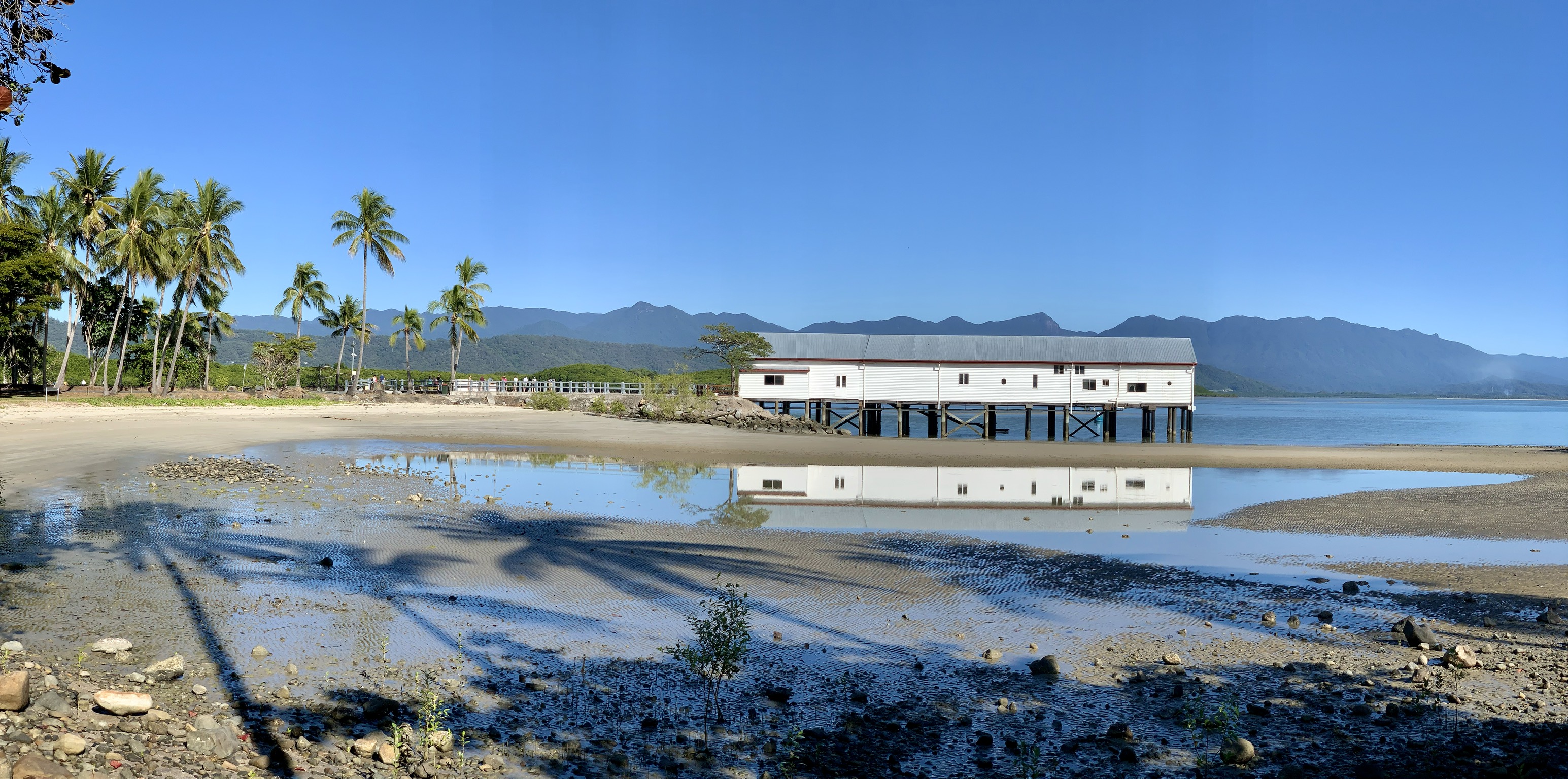 Heritage Port Douglas wharf and former storage shed across the inlet